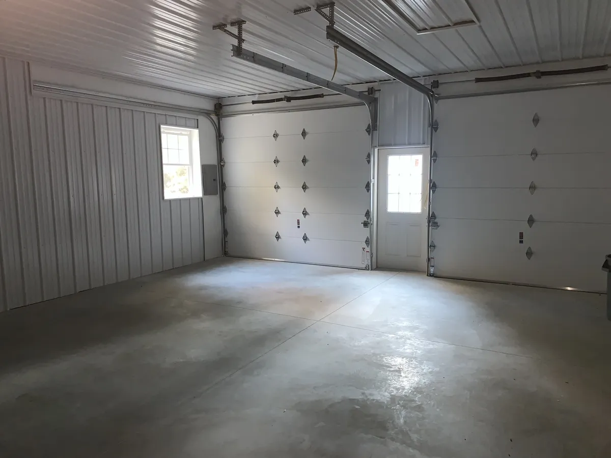 Finished concrete floor inside a Cimino pole building