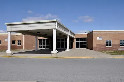 Brick commercial building with a covered entryway designed by Minneapolis Commercial Exteriors.