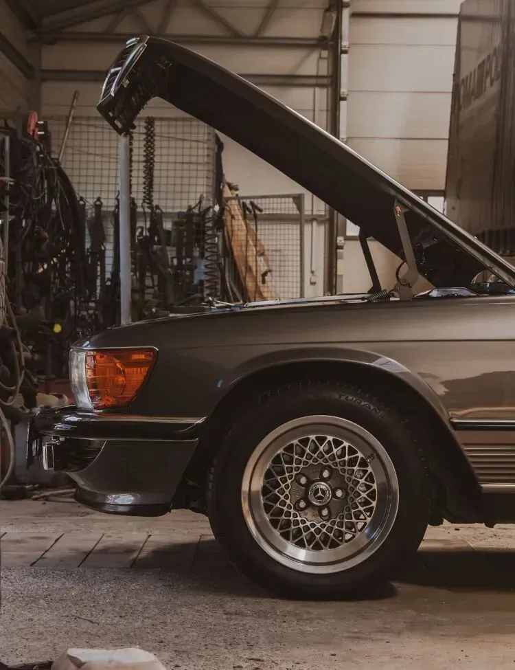 Professional technician completing automotive engine service