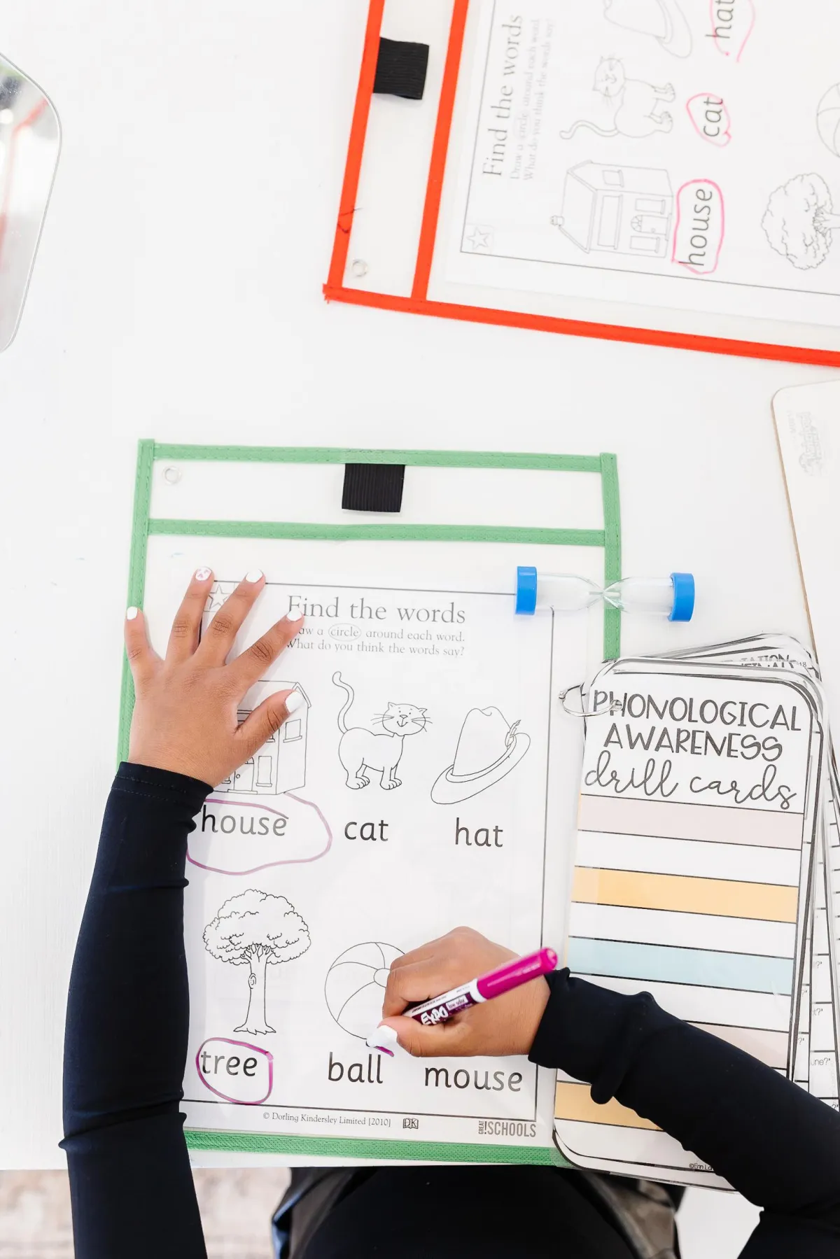 grey and white corded headphones