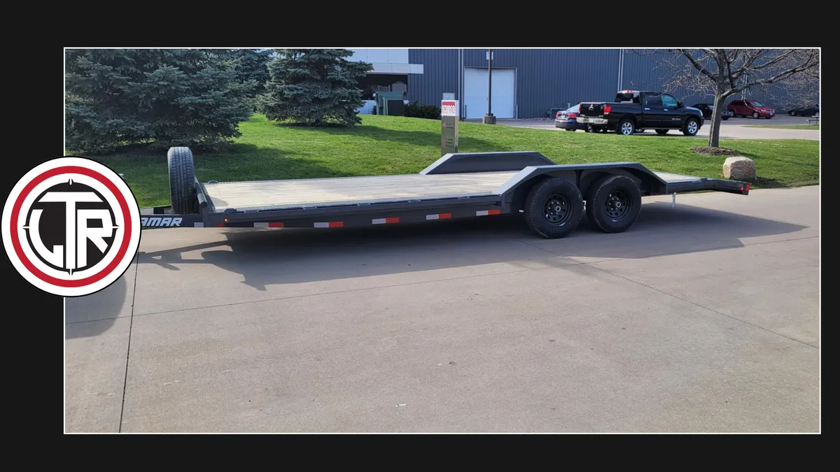 Car hauler for end-of-month lease turnover vehicle transport at Lakeside Trailer Rentals in Webster, New York