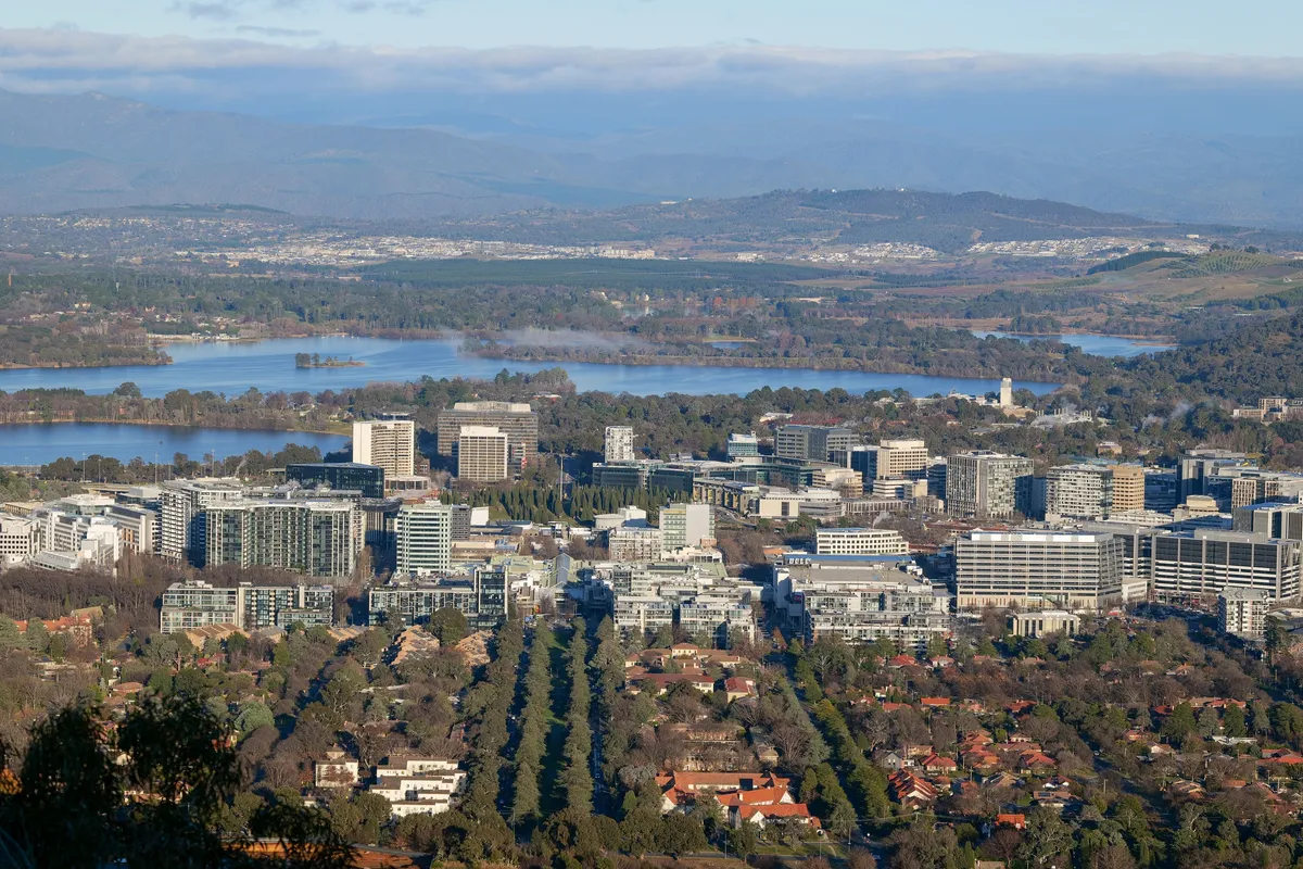 Aerial view of an Australian city and surrounding neighbourhoods
