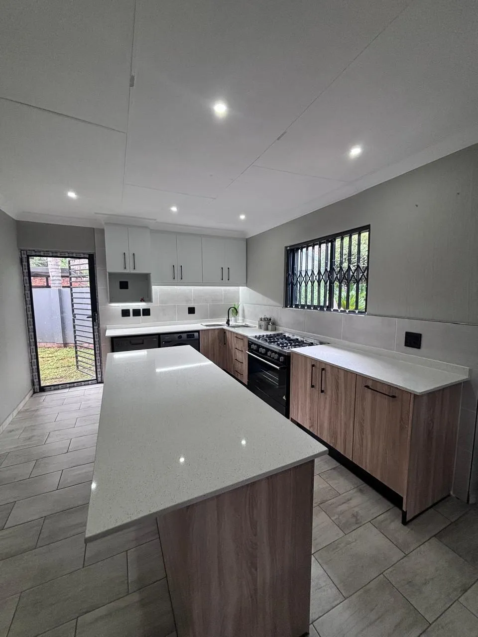 Luxurious modern kitchen crafted with high gloss cabinetry and bespoke finishes