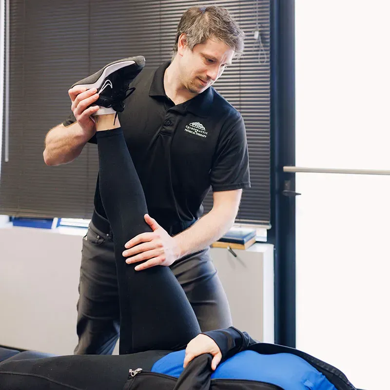 SpineEase 3000 spinal decompression table in a bright clinic room