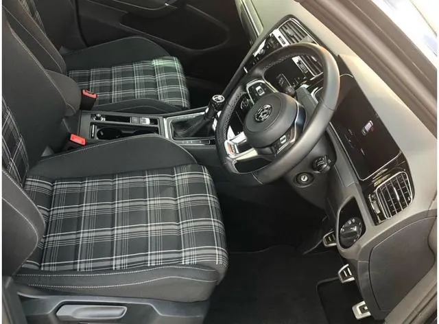 Interior of a mk7 Volkswagen golf with tartan seats