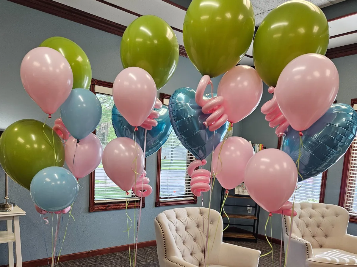 Colorful balloon flower arrangement with bright tropical design