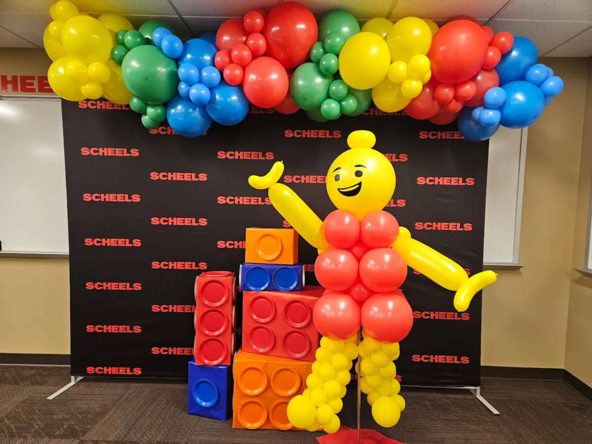 Colorful balloon arch with LEGO theme balloon sculpture display