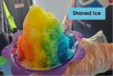 Rainbow shaved ice dessert served fresh at events in Grand Forks ND
