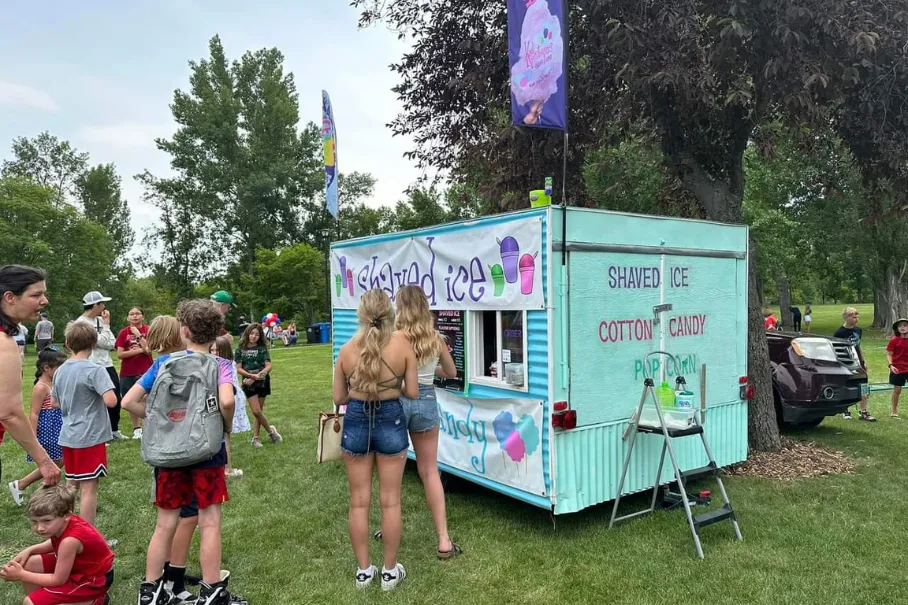 Shaved ice and cotton candy trailer at outdoor event
