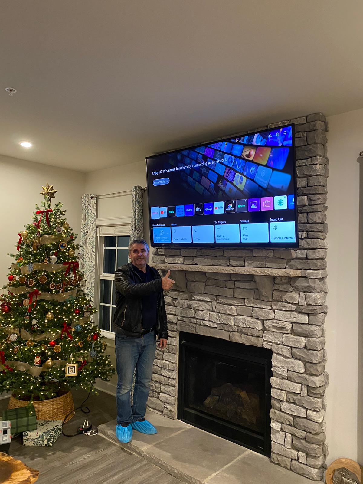 TV mounted above fireplace in Alexandria VA
