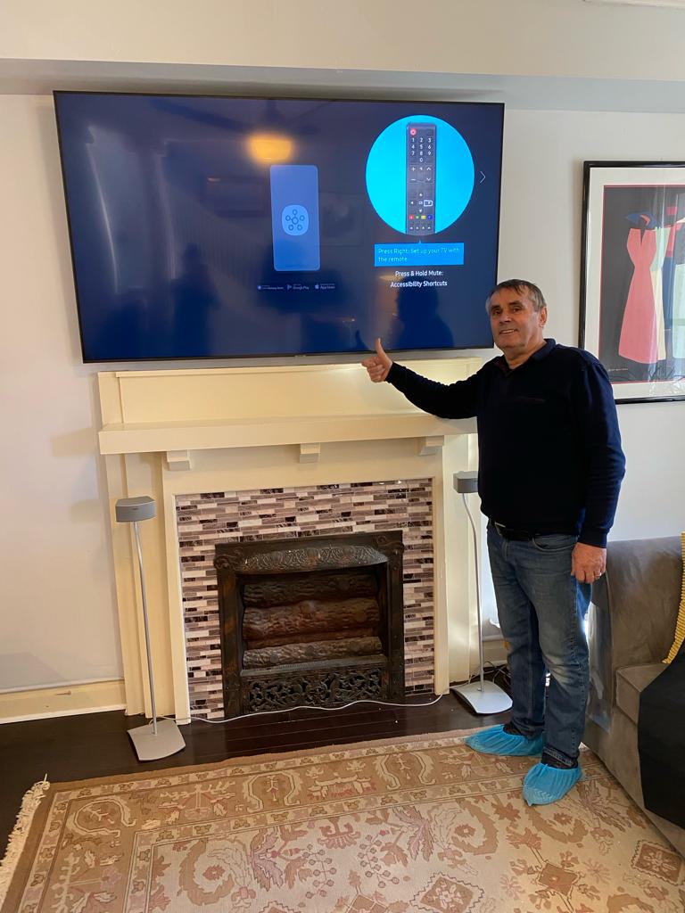 TV mounted above fireplace in Arlington VA