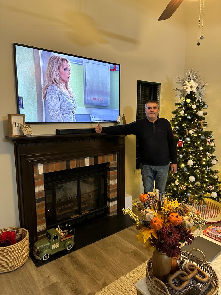 TV mounted above fireplace in Woodbridge VA