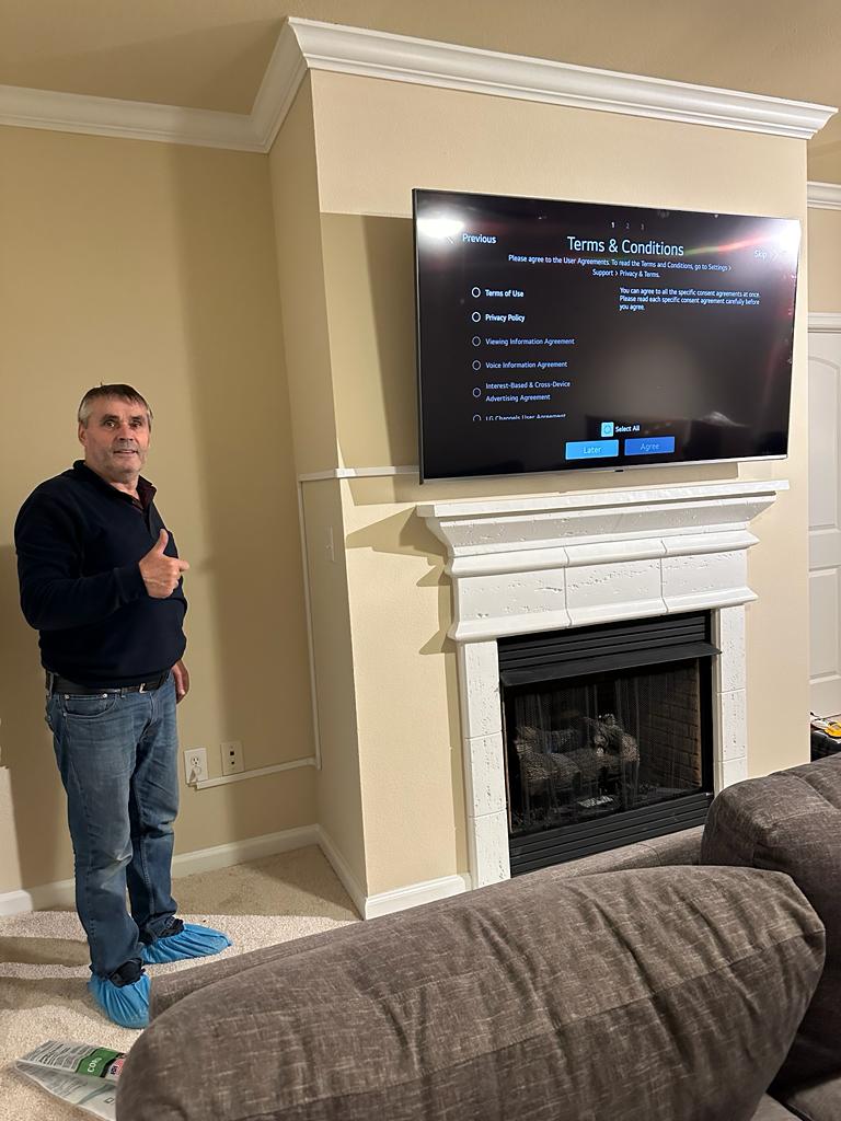 TV mounted above fireplace in Chantilly Virginia