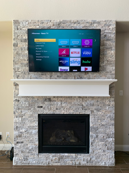 TV mounted above fireplace in Centreville Virginia