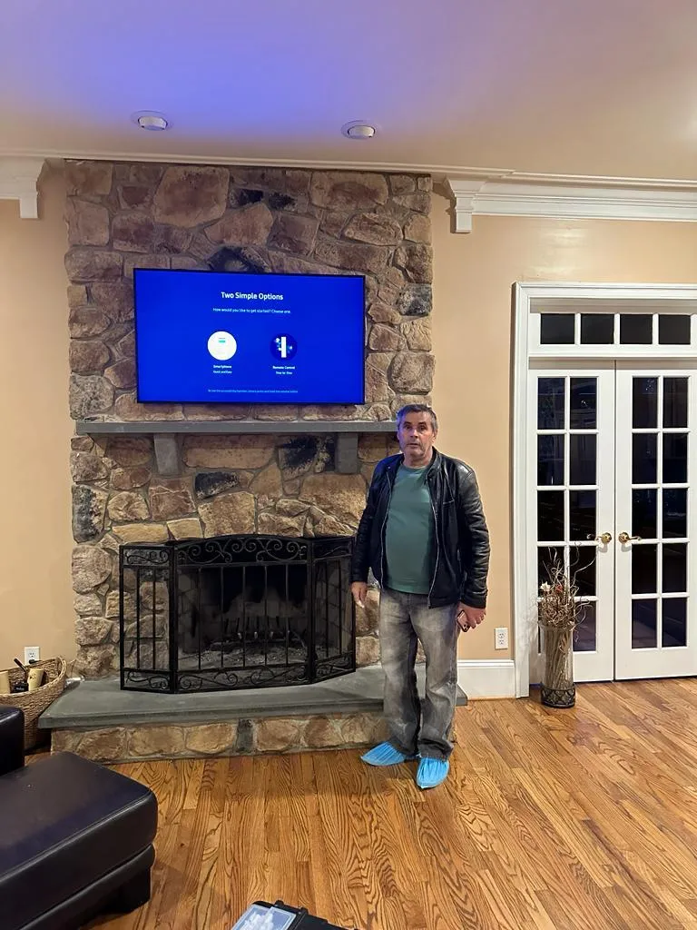 TV mounted above fireplace in Marshall Virginia
