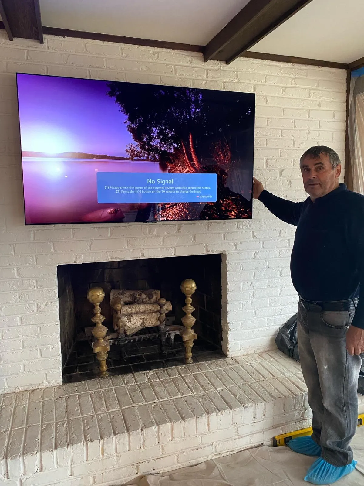 TV mounted above fireplace in Front Royal Virginia
