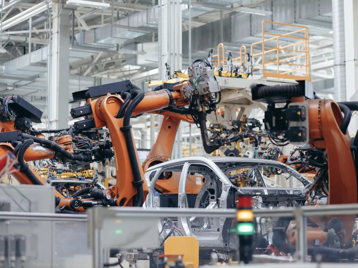 Automated car manufacturing with robotic arms