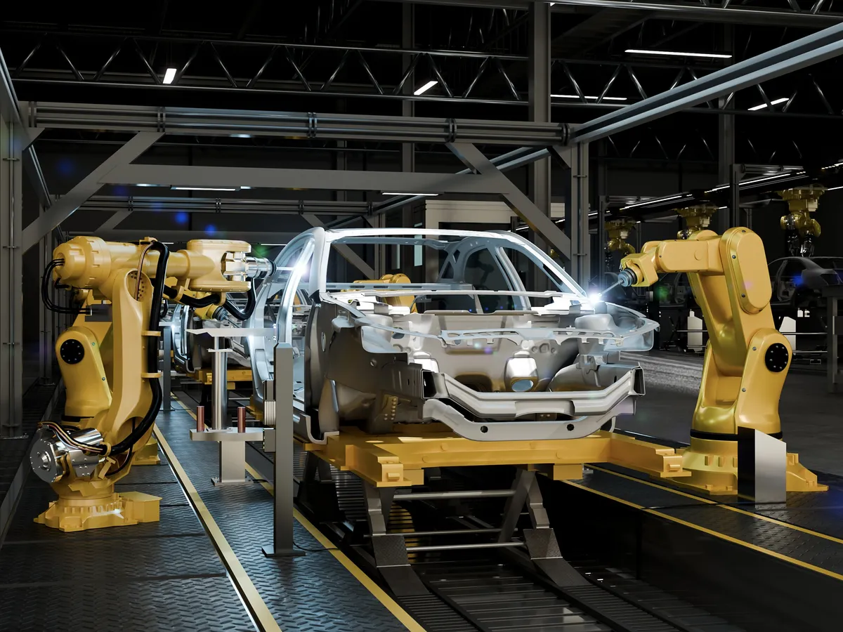 Automated robotic arms assembling a car