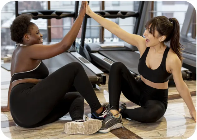 woman looking at plate with little food on it