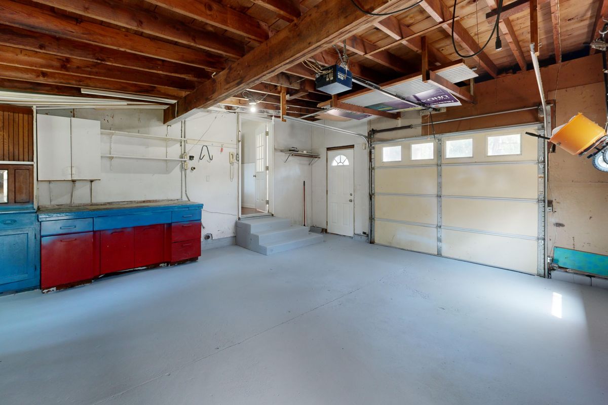 Residential garage with gray coated concrete floor in Ocala, Florida