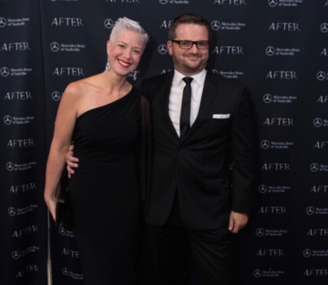 Brigitta Hoeferle with The Culture Guy, Christian Hoeferle - aligned at a red carpet business event driving high-level conversations on culture, leadership strategy, and values-based growth focused on organizational excellence and executive influence. The Culture Mastermind