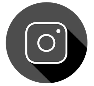 Instagram logo icon in white on a dark gray circular background with a long drop shadow.