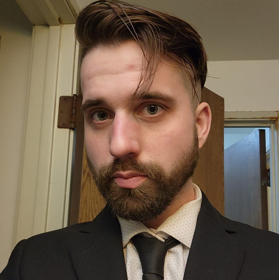 Photo of Jeremy Pagel offering LIHEAP heating assistance support