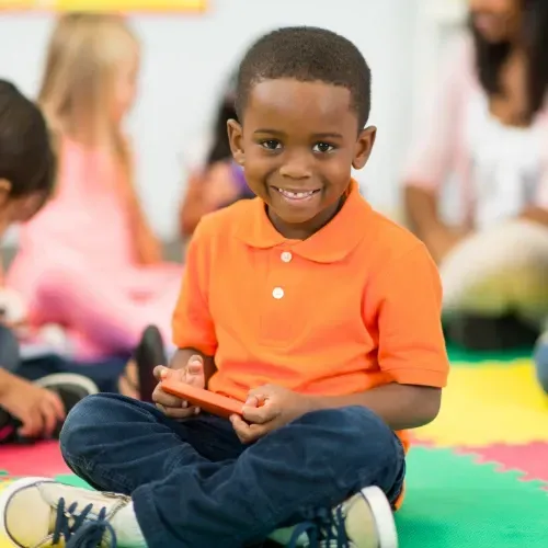 Children engaged in play-based learning at Learn & Play Child Center, showcasing The Creative Curriculum® in action.