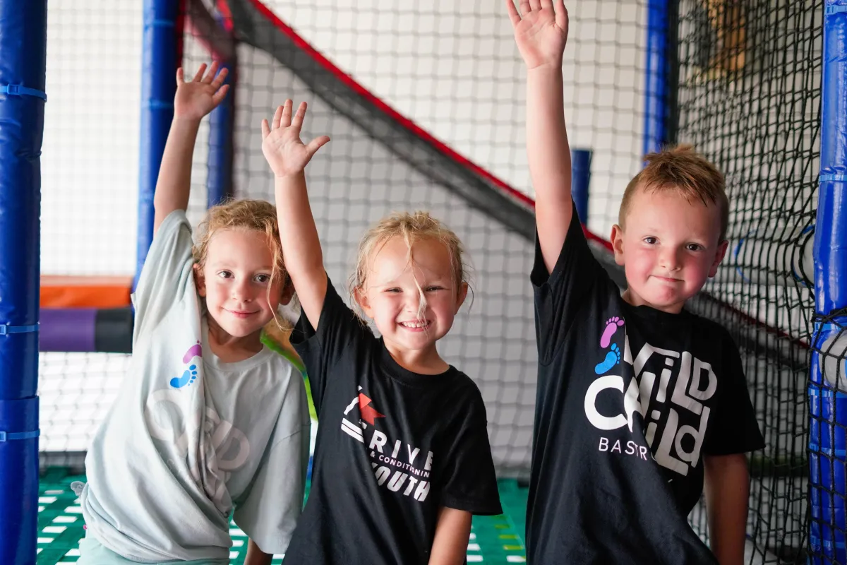 Indoor playground at Wild Child Bastrop with soft play equipment and kids exploring