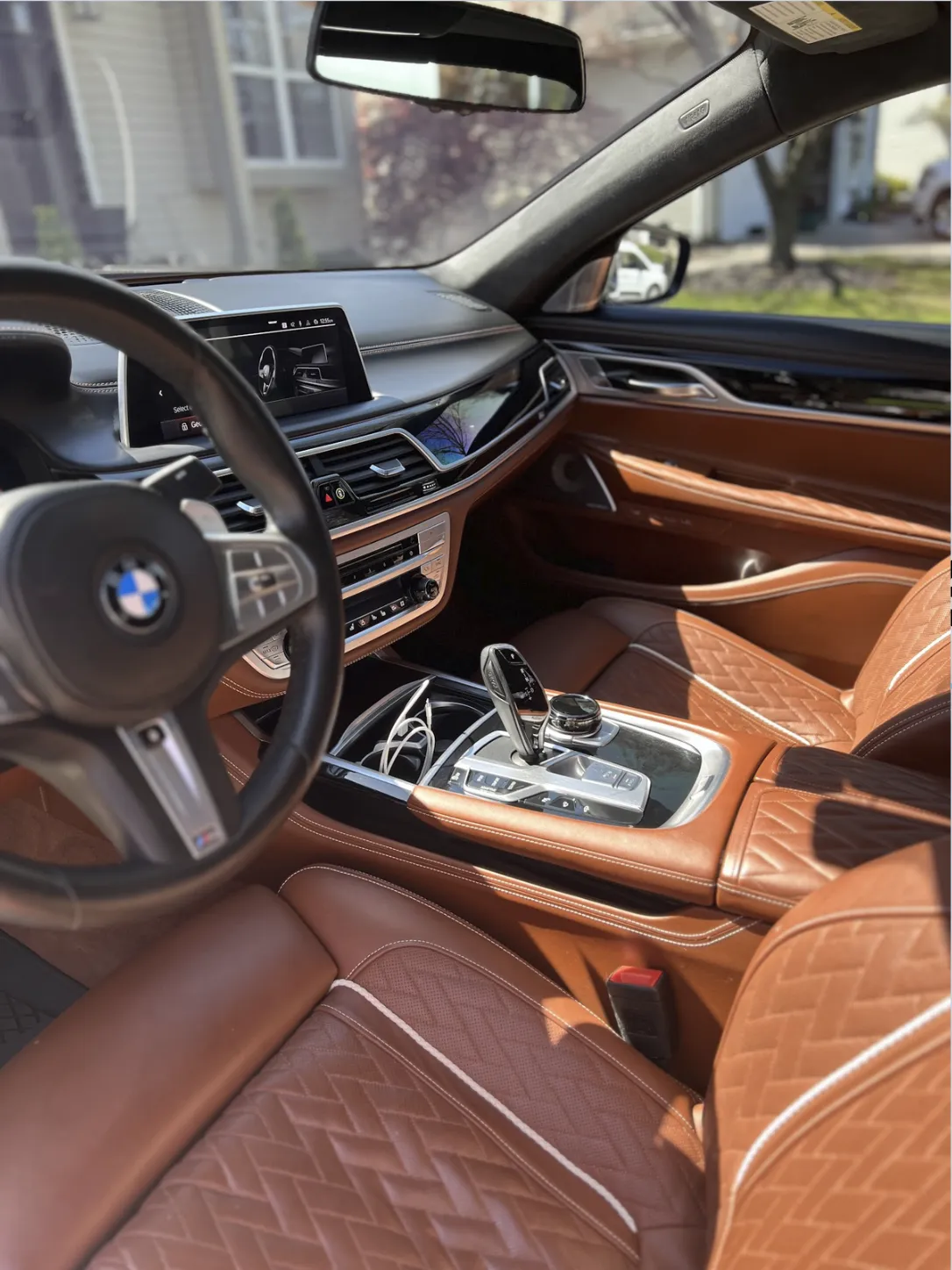 Luxury BMW interior detailing with deep leather cleaning and conditioning in South Jersey.