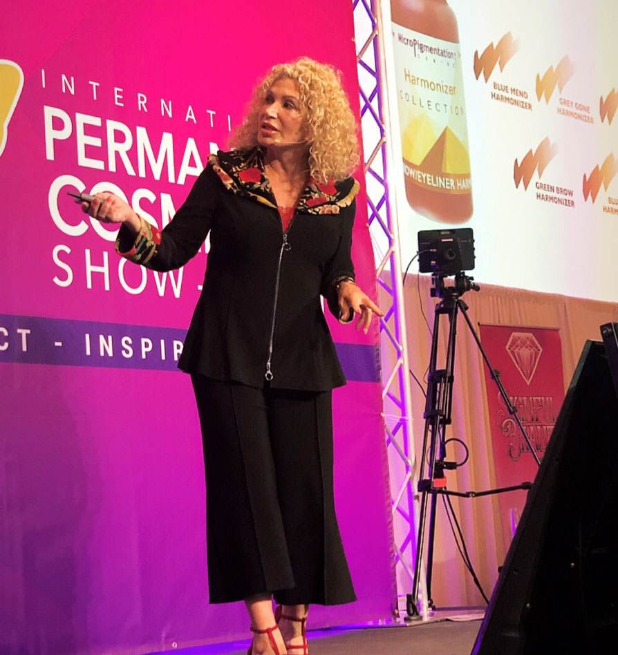 Pat Shibley, speaking at an international  PMU conference 