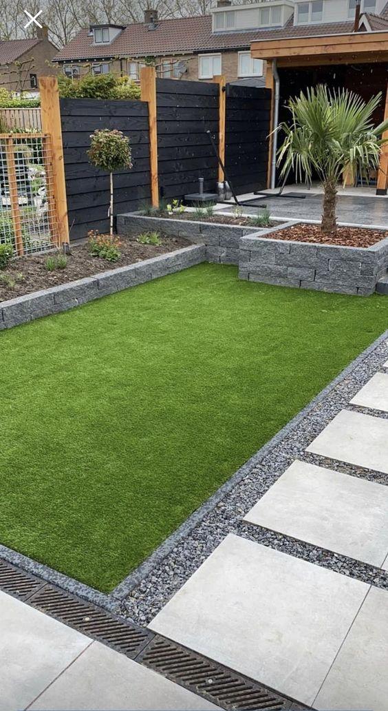 backyard with artificial grass section