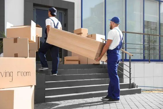 males moving boxes