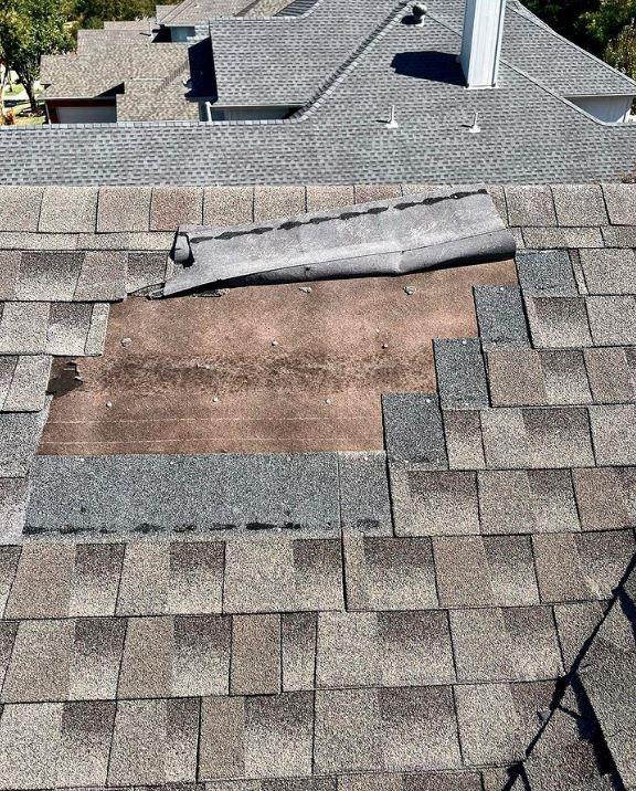 repairing roof shingles
