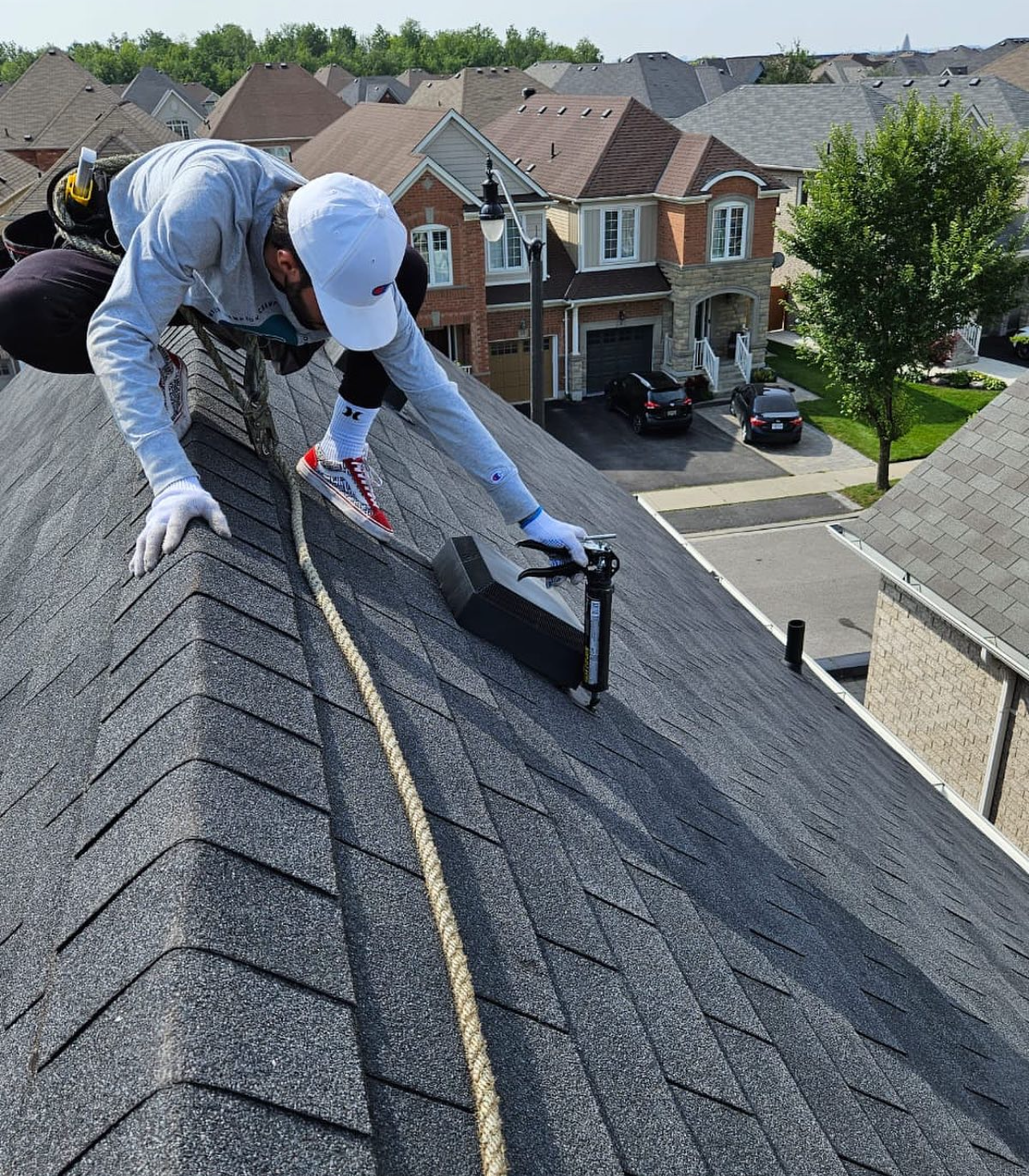 roofer doing roof inspection