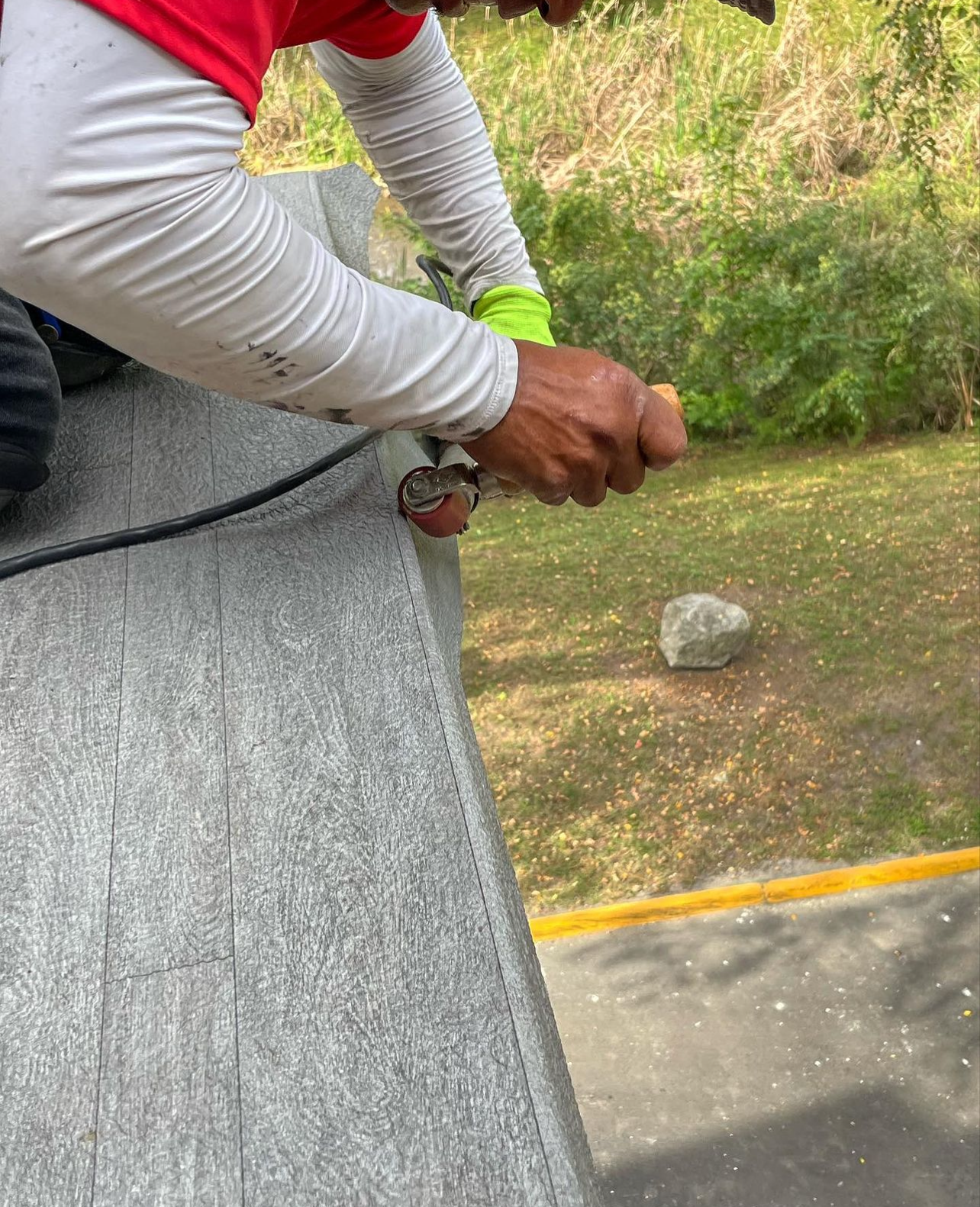 man repairing a roof