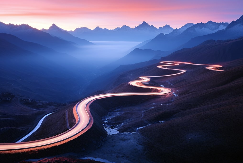 man sitting on rock surrounded by water