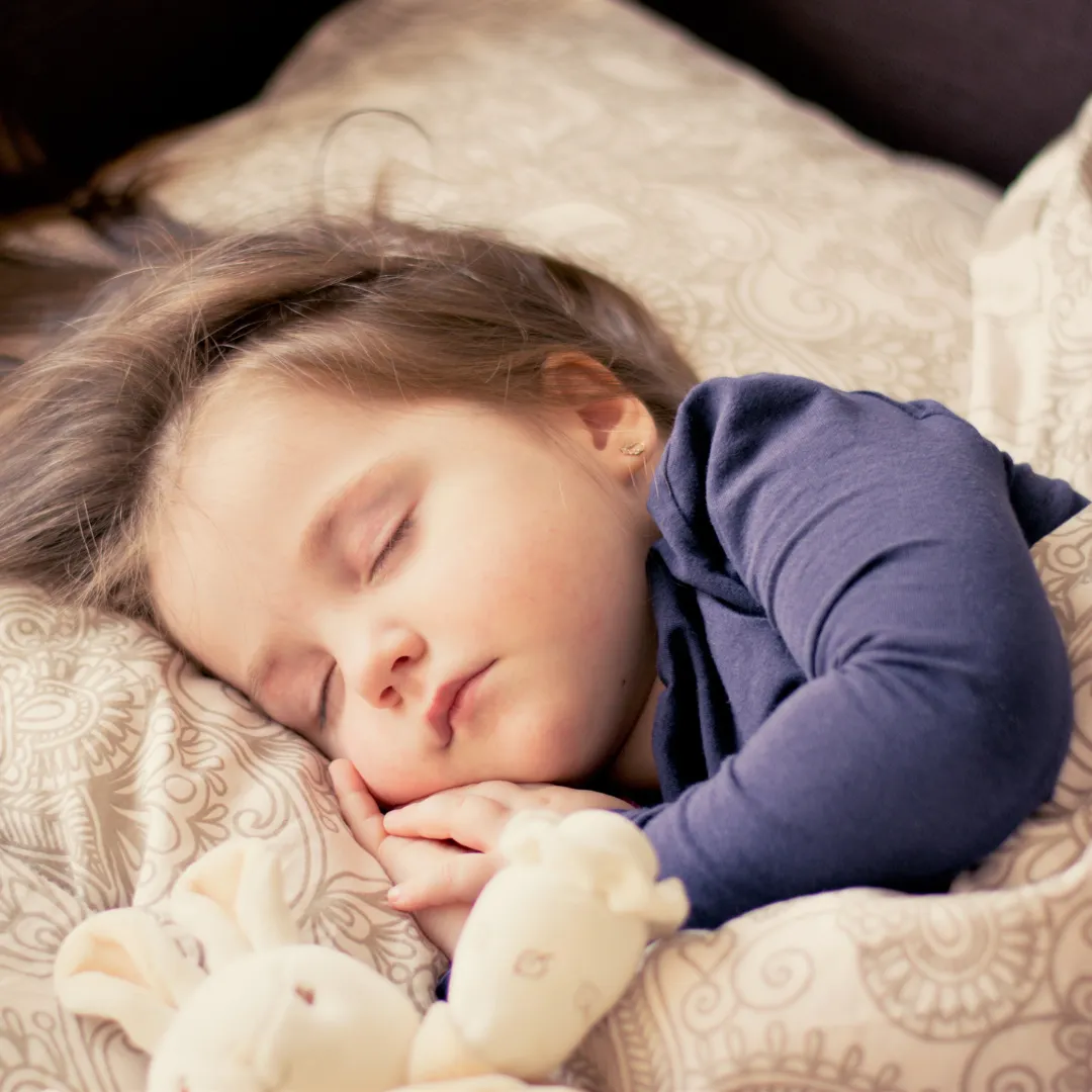 A child sleeping soundly after taking homeopathic remedies