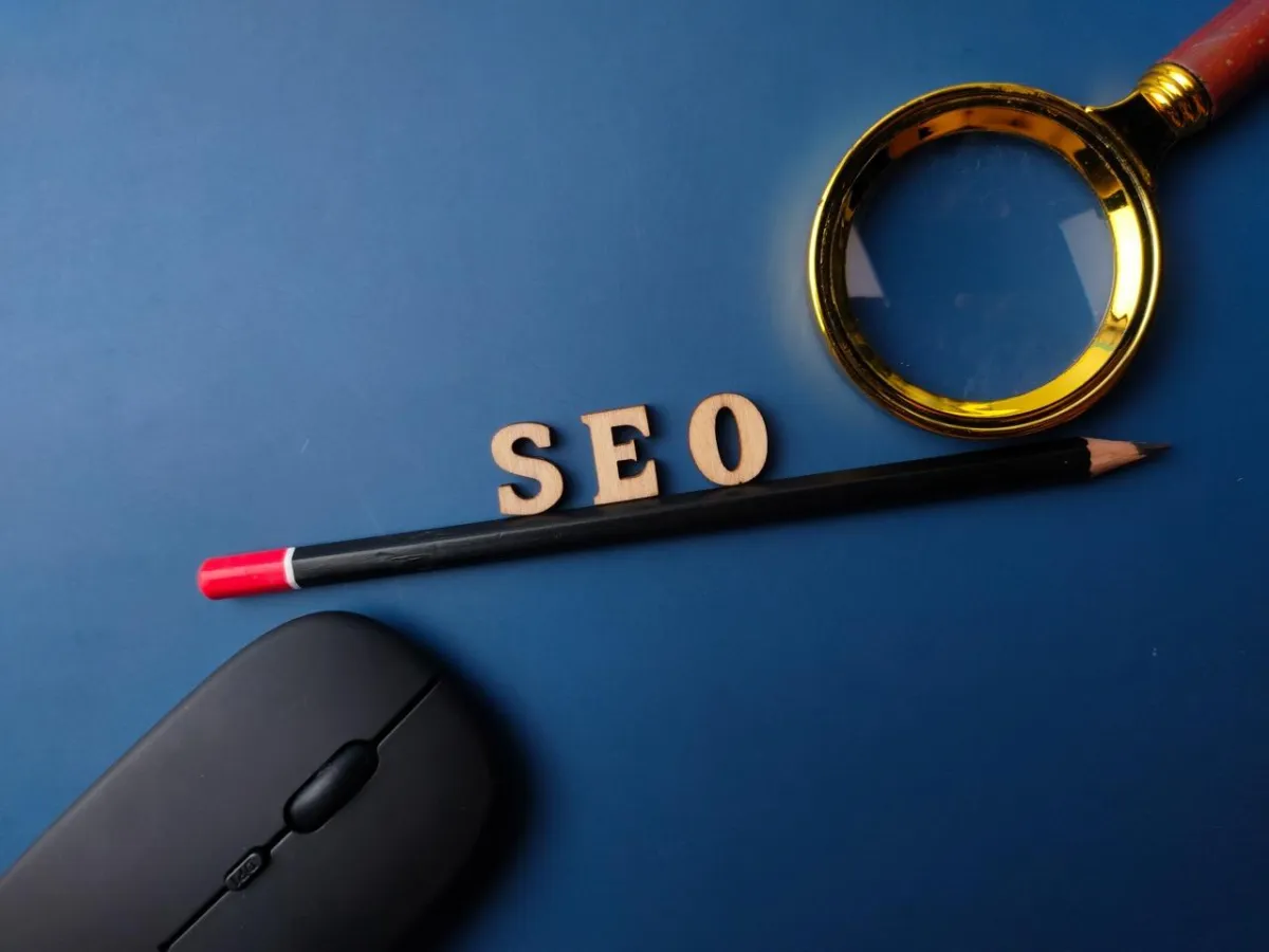 Organic SEO That Attracts Pre-Qualified Decision-Makers-top-view-pencil-and-word-seo-with-black-magnifying-2026 Large