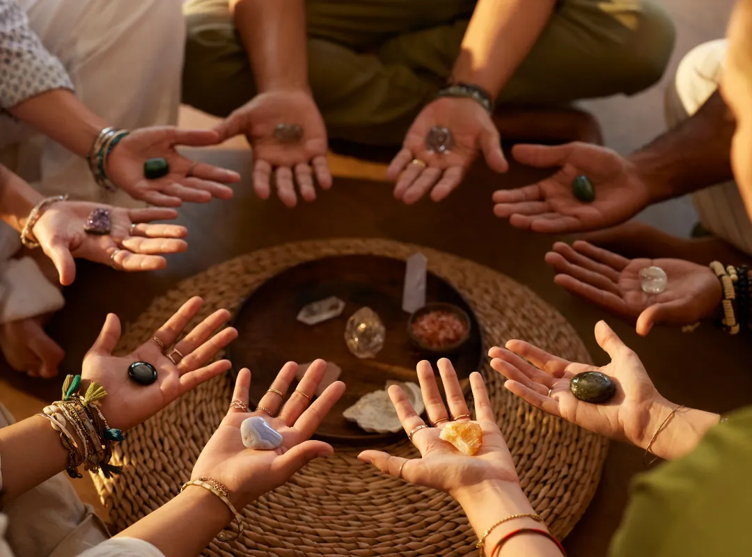 woman in black shirt and black pants sitting on bed