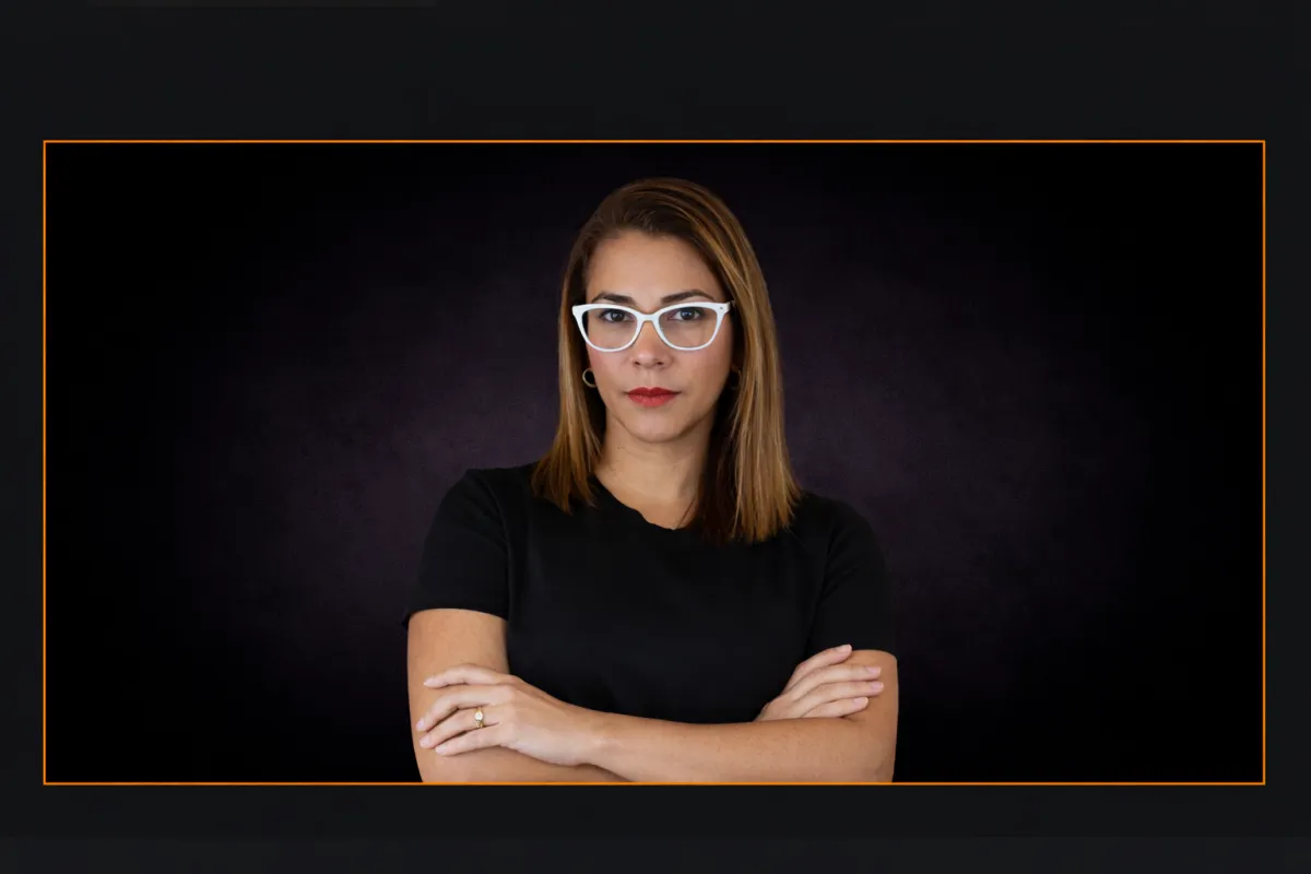 A sleek white sports car on a black background