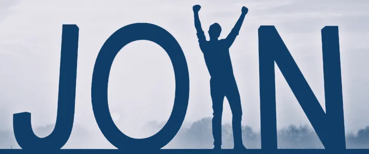 The word Join is written in dark blue next however the i is a gentleman holding his hands in the air n a white bakground