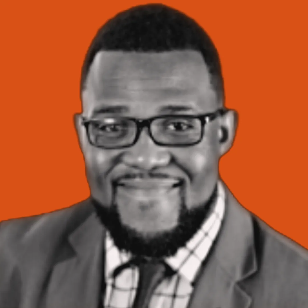 a black and white portrait of Justin Camper, a business and intellectual lawyer, on an orange background 