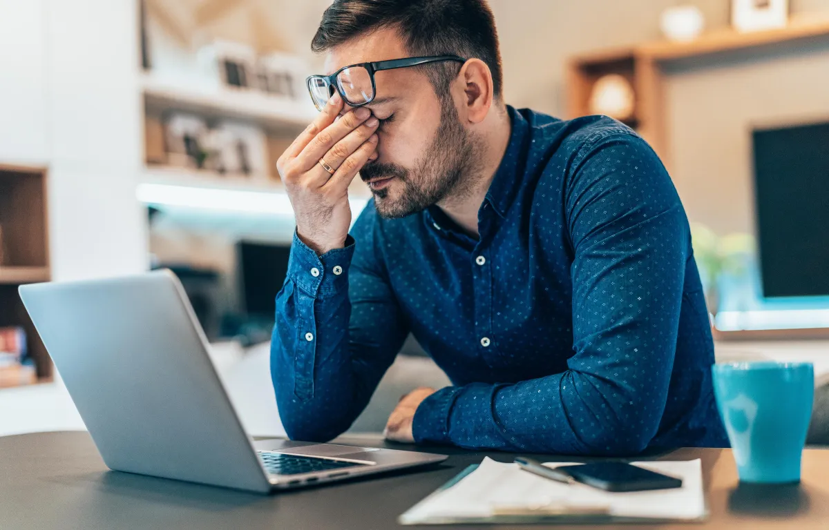 frustrated man with laptop