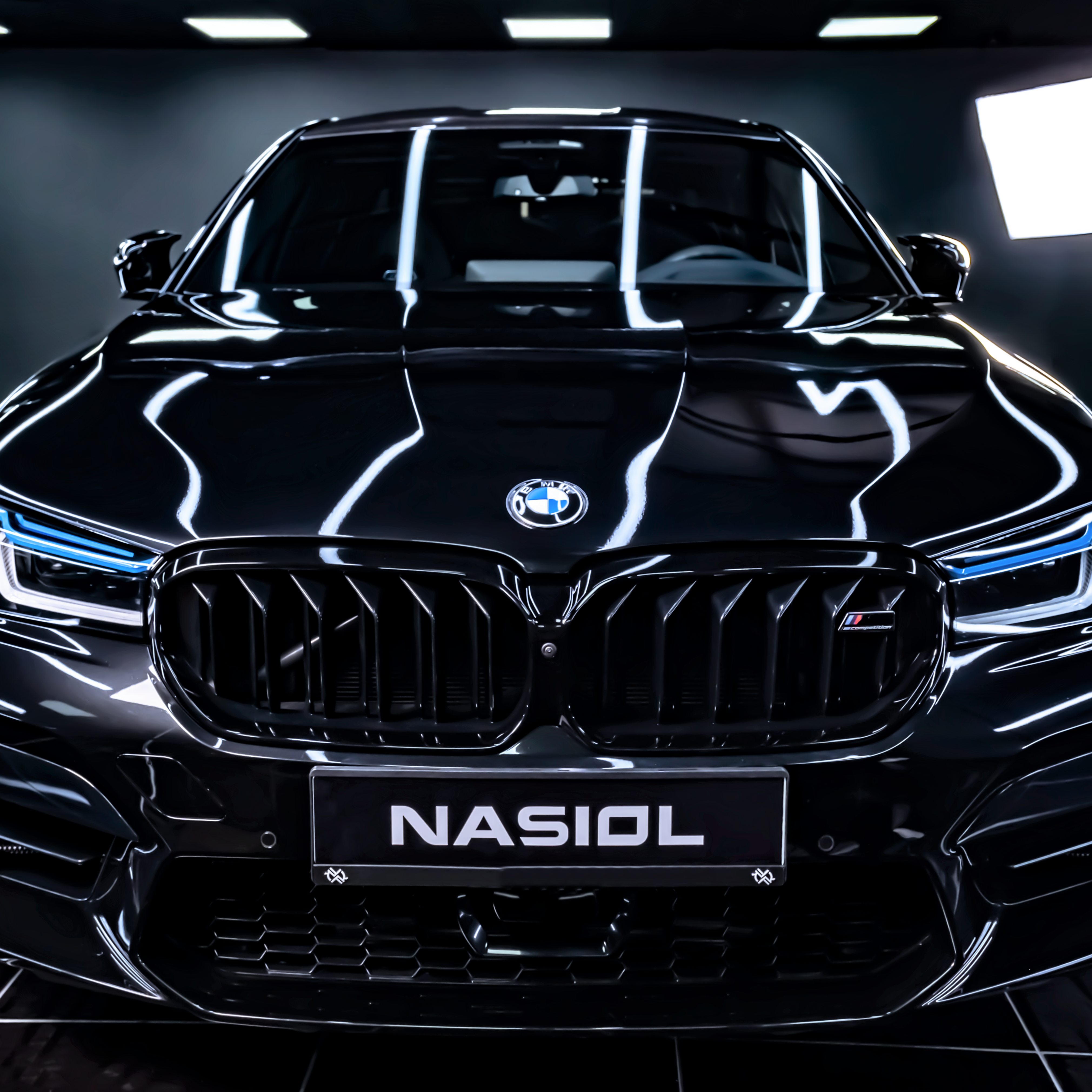 a person standing next to a car