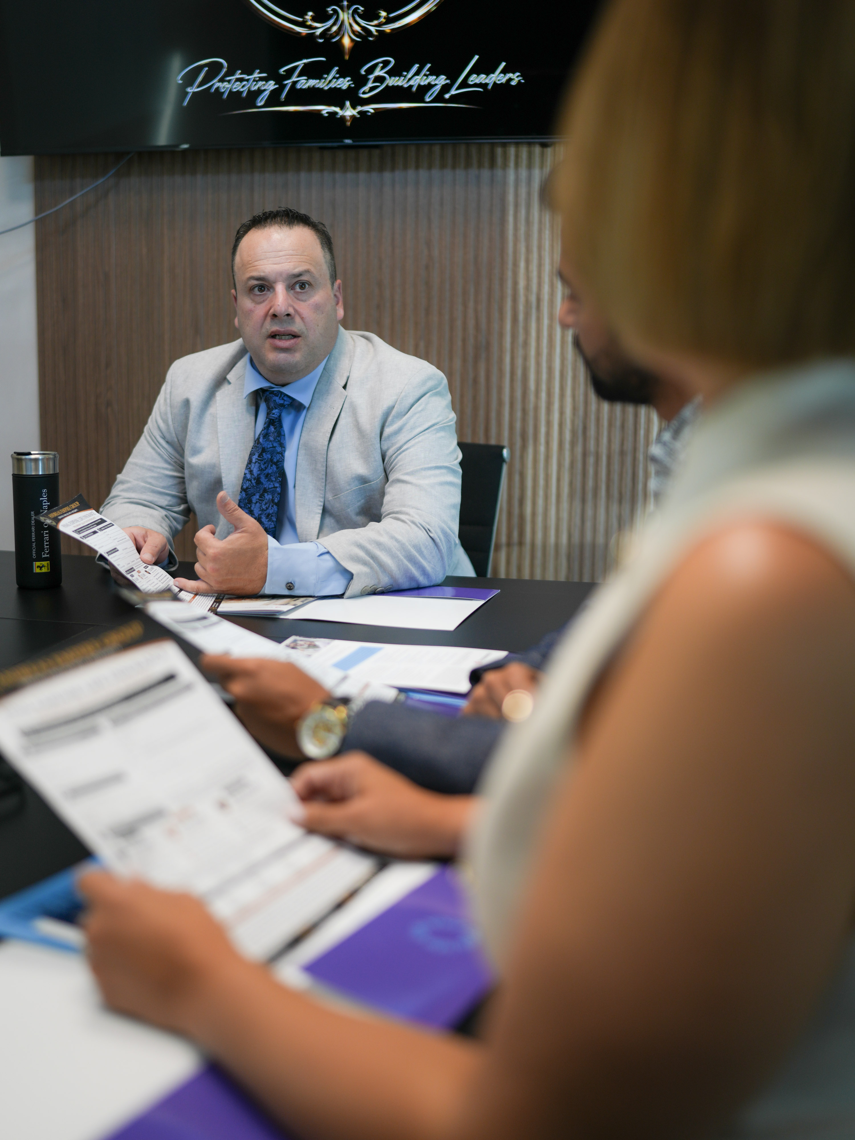 AEG team discussion in a professional meeting.