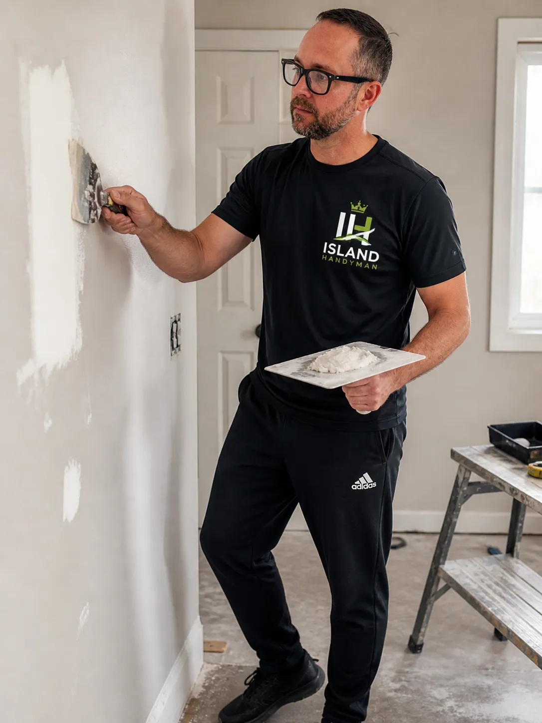 Handyman in Victoria BC providing drywall repair and installation services