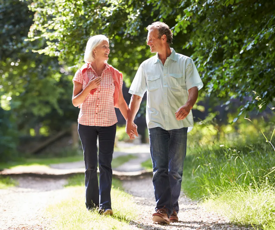 happy cataract couple walking together