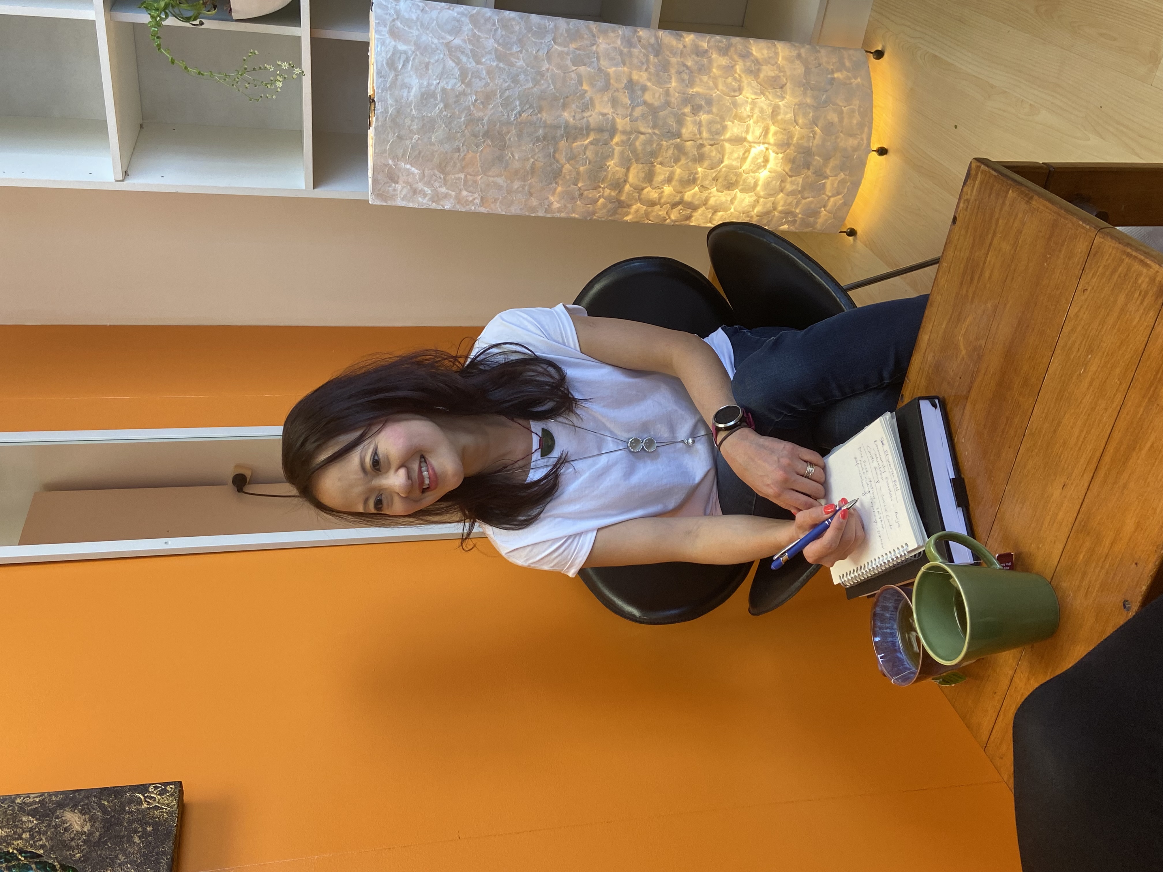 Founder of BreastWise offering a warm, calm smile