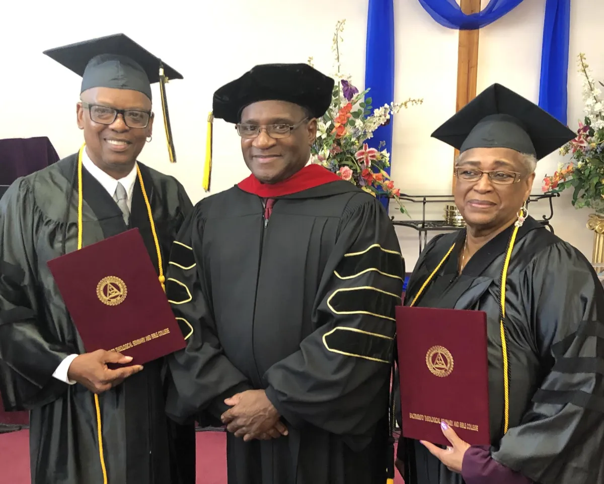 a woman holding a sign that says all is love